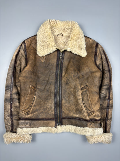 Brown leather jacket with white fur lining on a gray background